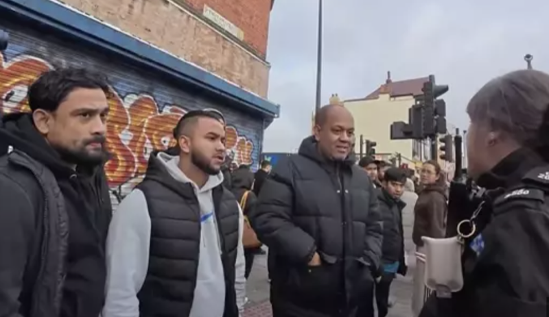Christian street preacher speaking in public